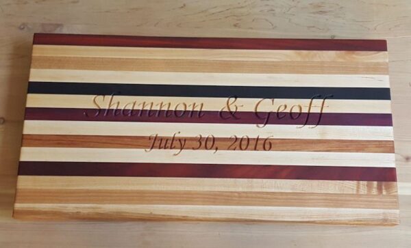mixed wood cutting board with wedding date