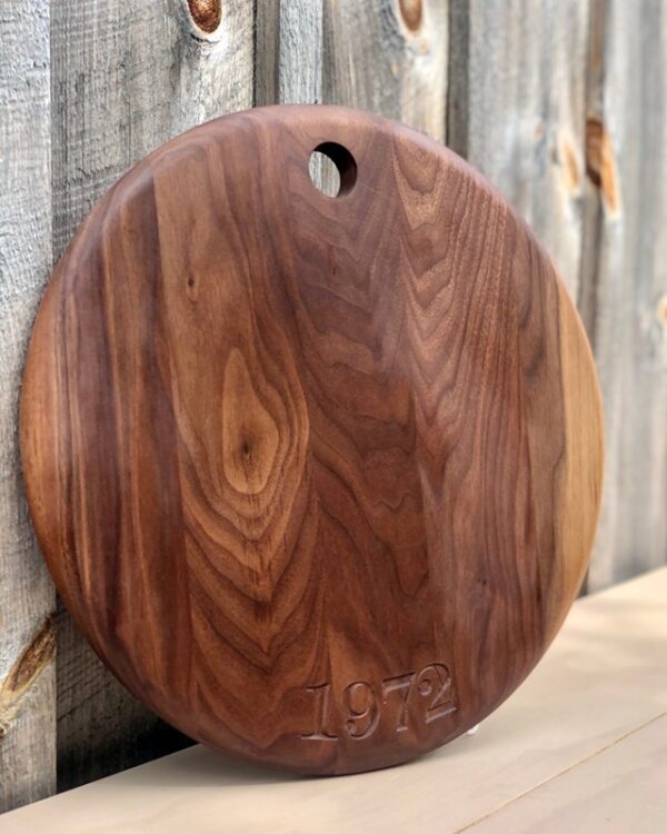 Circle serving board with date engraved