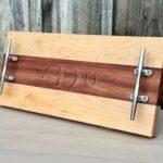 Nautical cleat serving board with cleats and monogram engraving