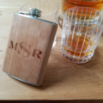 Wooden flask engraved with a monogram